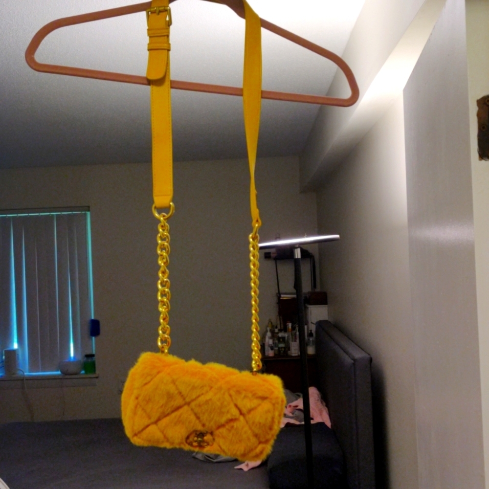 Vintage designer faux fur mini bag with gold chain detail